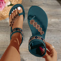 Fashionable flat sandals with a specially designed toe loop and toe separator, featuring heart decorations and a bohemian style